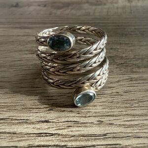 Elegant Silver Braided Ring with Blue Gemstones